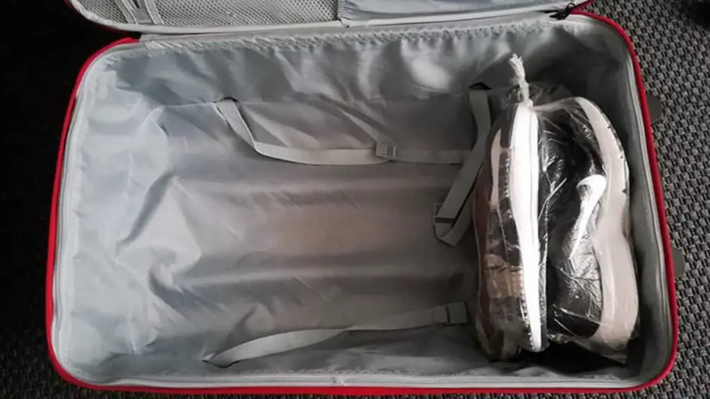 Place Shoes At The Bottom Of The Suitcase